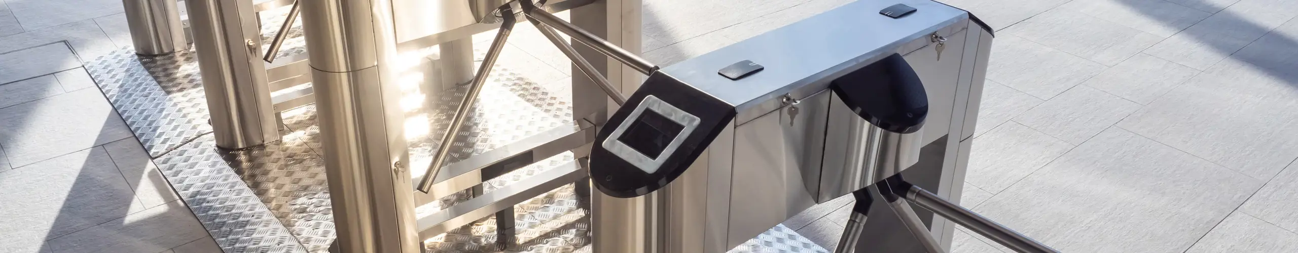 Electronic turnstile. Access system to the building. Pass through the passes. Security systems for rooms. Several turnstiles are installed nearby. Check Point. Automatic checkpoint. Building security.